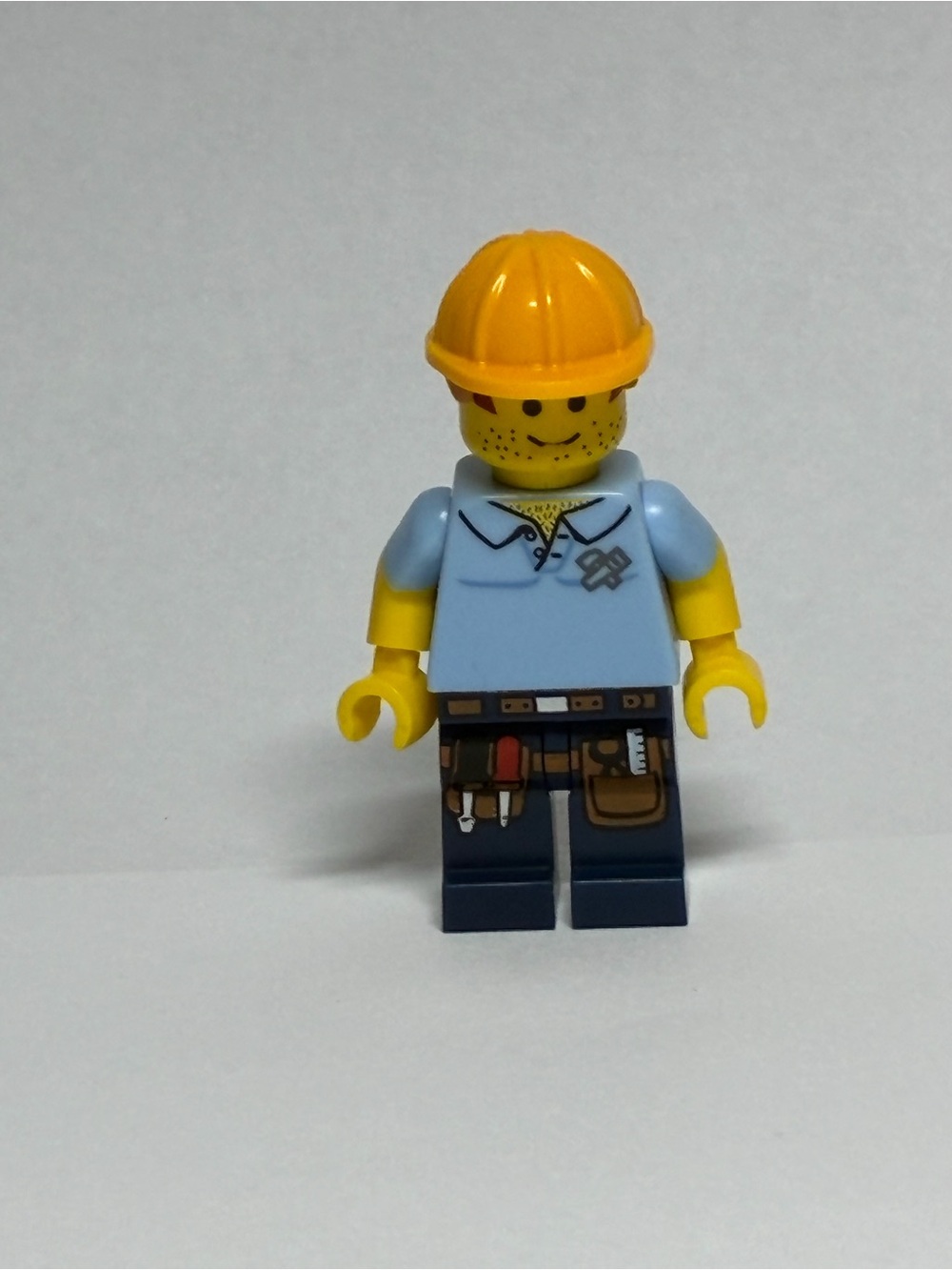 Lego Yellow-Helmet Construction Worker Minifigure with Light Blue Torso
